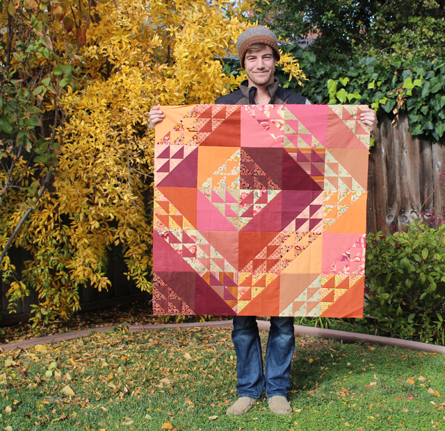 Autumn Reflections Wall Hanging made by Julie Cefalu with Jon Cefalu modeling.