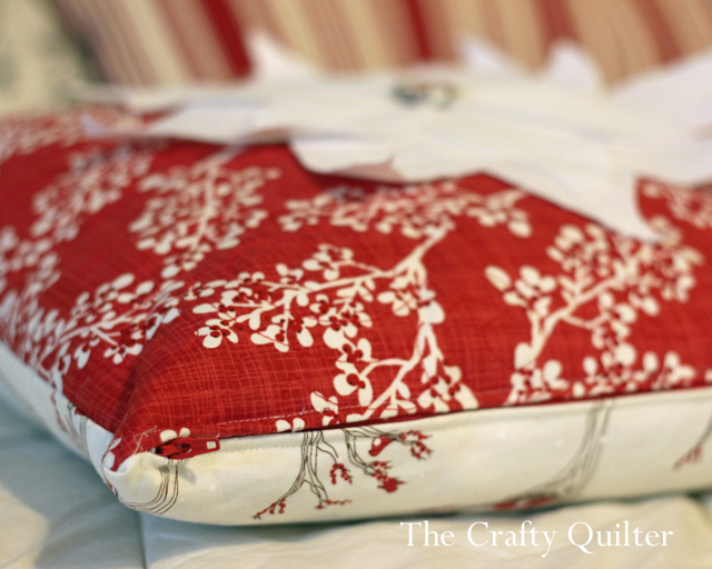 Poinsettia Pillow made by Julie Cefalu @ The Crafty Quilter