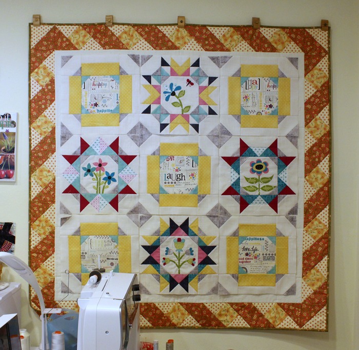 Maggie's First Dance BOM blocks on design wall at The Crafty Quilter