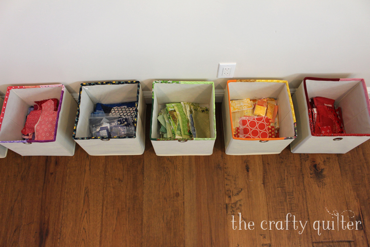 Easy Fabric Scrap Storage Bins @ The Crafty Quilter. See how easy it is to make your own colorful bins to hold all of your fabric scraps and keep them organized!