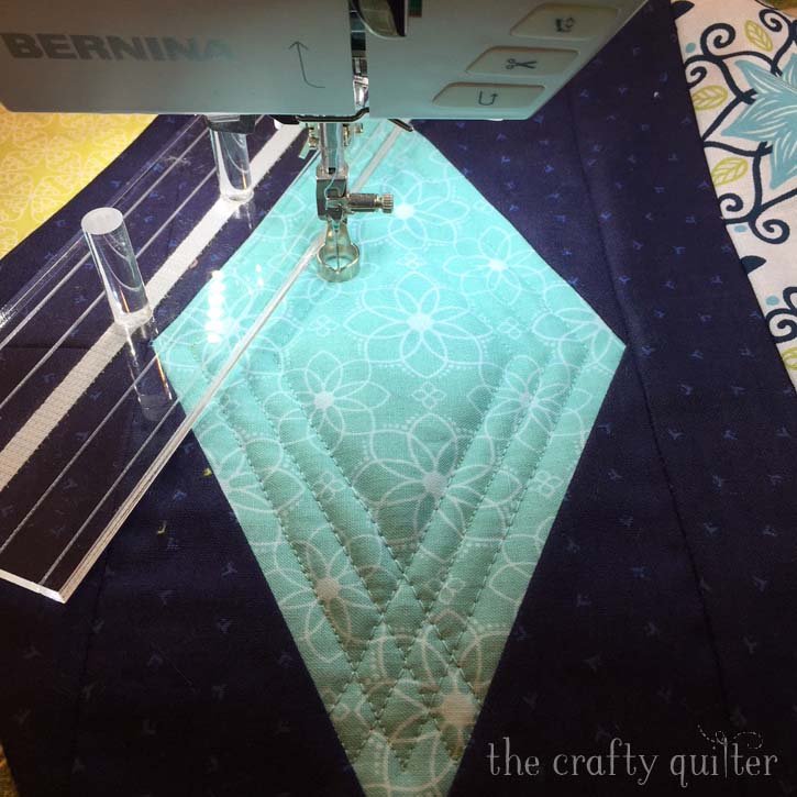 Sneak peak by Julie Cefalu @ The Crafty Quilter.  Featuring ruler work on a domestic machine.