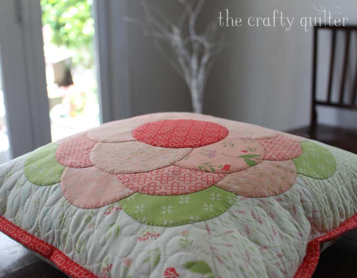 Front Porch Flower Pillow. A free tutorial by Julie Cefalu @ The Crafty Quilter for a 16" covered pillow using easy applique techniques. 