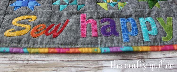 Sew Happy Mini Quilt Tutorial (free) by Julie Cefalu @ The Crafty Quilter. Finished quilt size is 18 1/2" x 17" and the quilt blocks are 3".