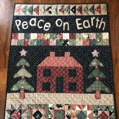 Peace on Earth made by Kathy J. and winner of the December UFO & WIP Challenge at The Crafty Quilter