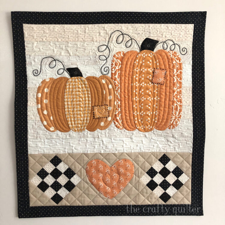 Patchwork Pumpkins Wall hanging made and designed by Julie Cefalu @ The Crafty Quilter.