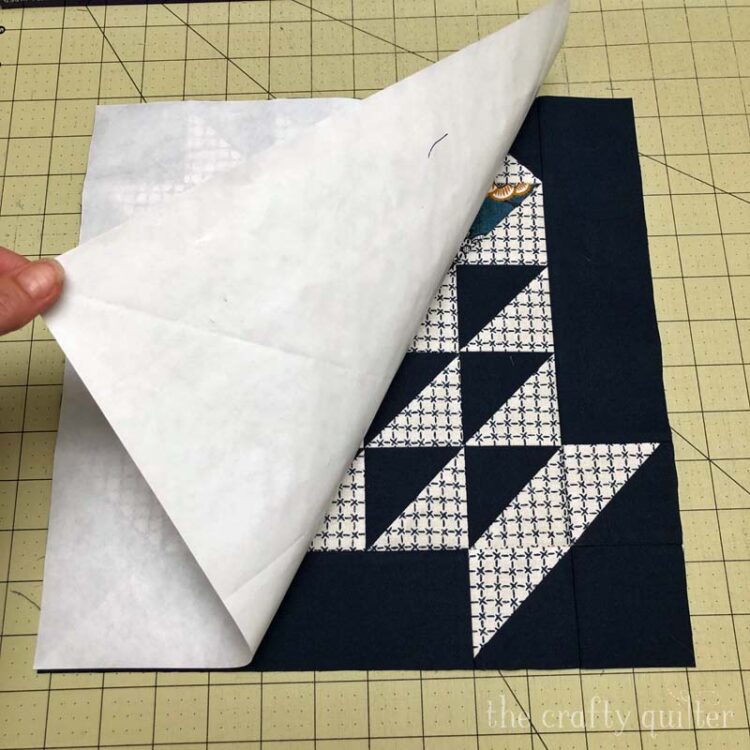 Check out how to square up a quilt block that is larger than your ruler.  This freezer paper method works for any size block. @ The Crafty Quilter