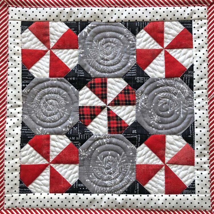 Peppermint Snowball Candy Mat - a free pattern from The Crafty Quilter.  Perfect to set underneath a bowl or plate of cookies and candy.