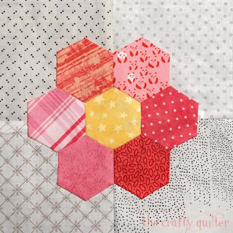 Hand stitching projects include these English Paper Pieced hexagon flowers @ The Crafty Quilter