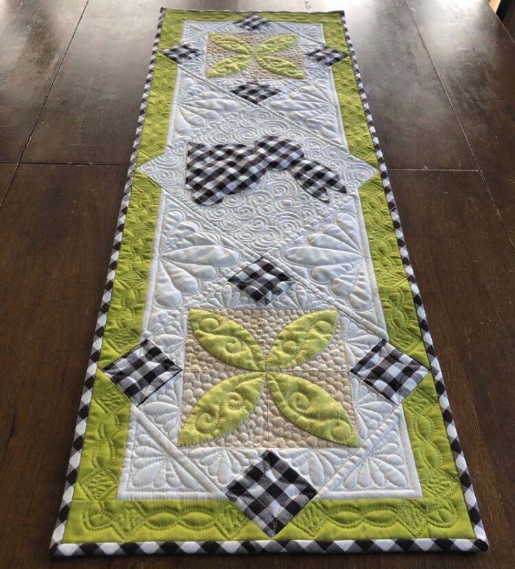Love this Spring Bunny Table Runner tutorial from Julie @ The Crafty Quilter.  Simple applique and two pieced blocks make this a cute and fast project for Spring and Easter!