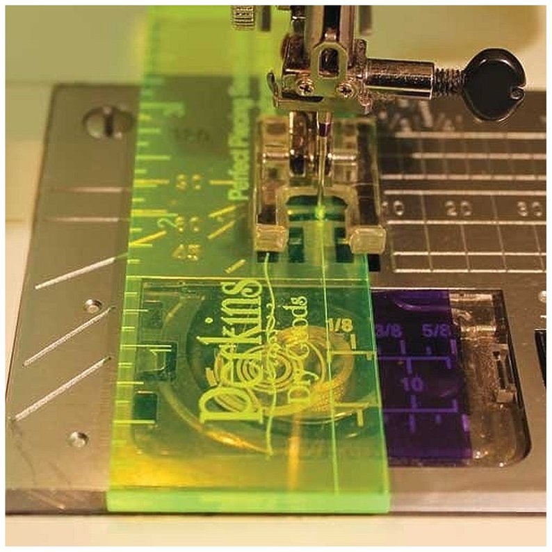 The Perfect Piecing Seam Guide - used to create the perfect 1/4" seam allowance @ The Crafty Quilter