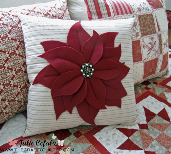 poinsettia pillow on bed 3 copy