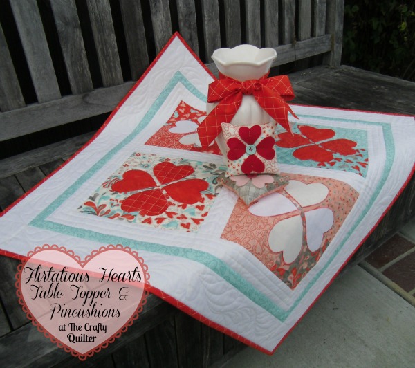 Quilted heart projects @ The Crafty Quilter includes this Flirtatious Hearts Table Topper for the Moda Bake Shop