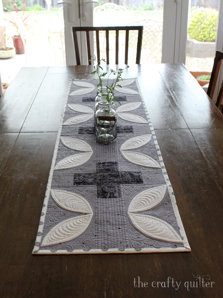 Modern Plus Signs Quilt Book Hop, table runner made by Julie Cefalu. Pattern is Petals Plus by Cheryl Brickey and Paige Alexander from their book, Modern Plus Signs