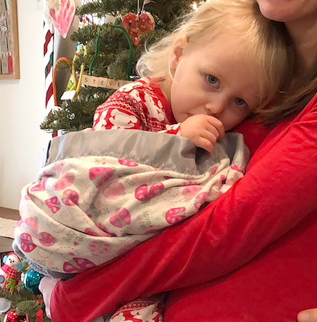 Amelia and her soft flannel blankie at age 2.