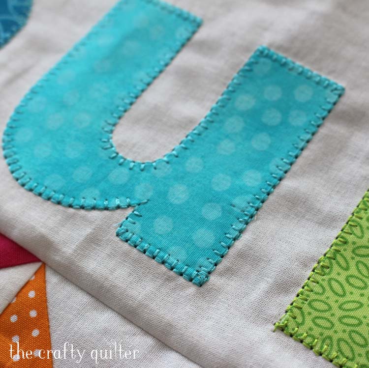 The Summer Fun Quilt Along @ The Crafty Quilter creates a bright and happy wall hanging that measures 30" x 32". Week 5 instructions include the SUMMER applique section and finishing instructions.