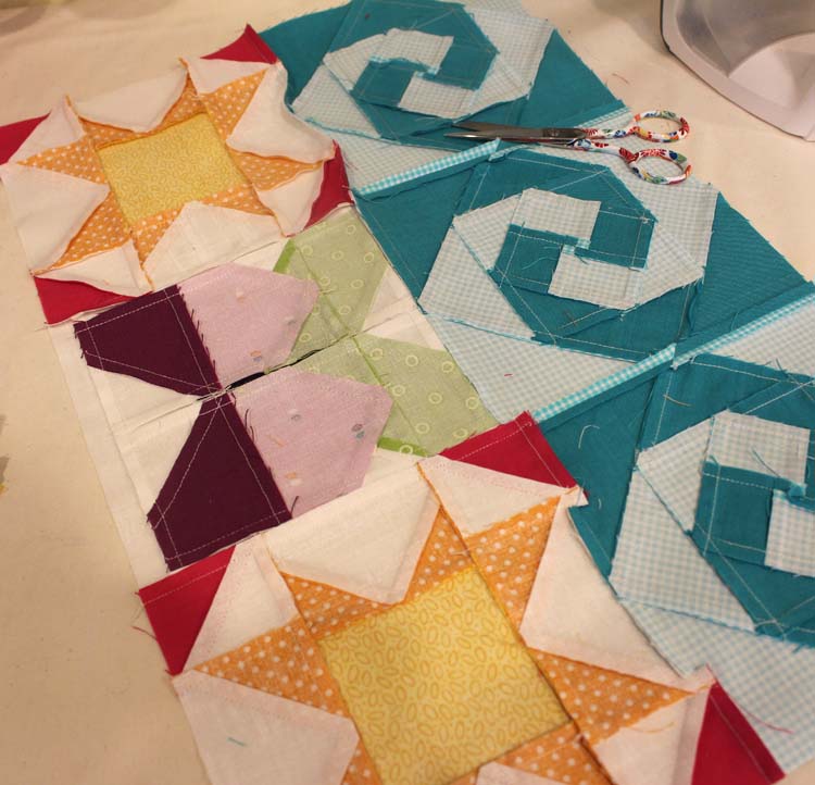 The Summer Fun Quilt Along @ The Crafty Quilter creates a bright and happy wall hanging that measures 30" x 32". Week 5 instructions include the SUMMER applique section and finishing instructions.