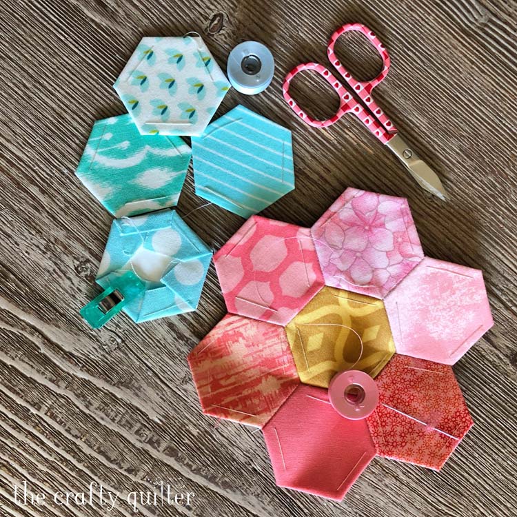 Hand stitching projects include these English Paper Pieced hexagon flowers @ The Crafty Quilter