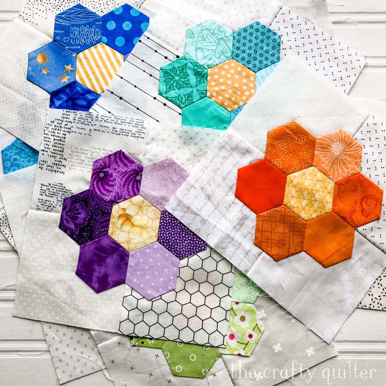 Hand stitching projects include these English Paper Pieced hexagon flowers @ The Crafty Quilter