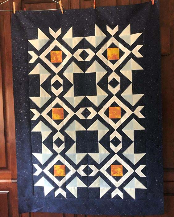 Arrow Stone Quilt made by Lucy Cesar. Pattern by The Crafty Quilter Designs.
