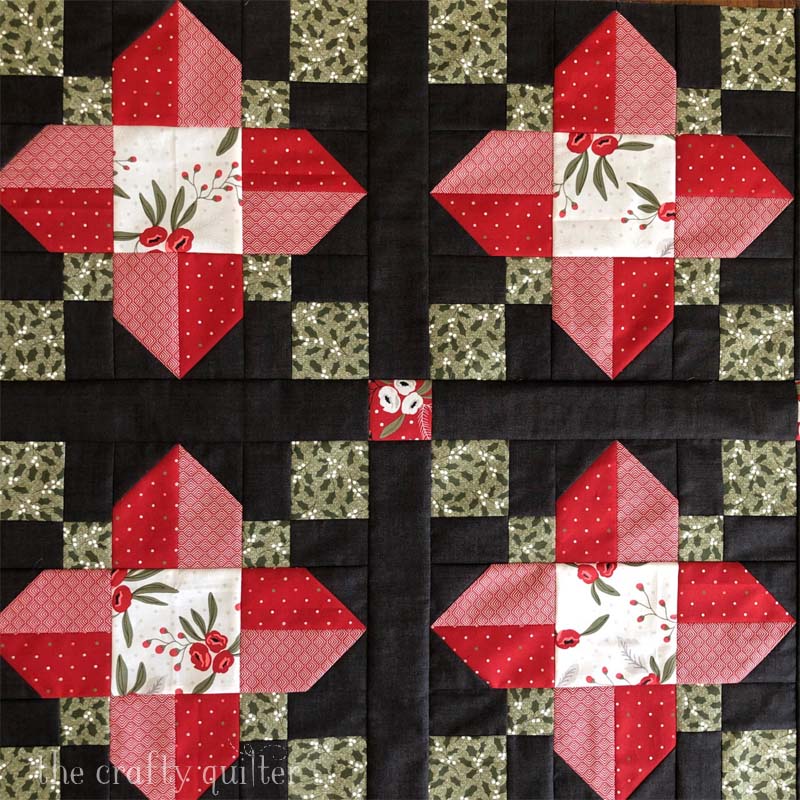 Vinca Quilt Block tutorial using Christmas Morning Fabric.  Tutorial @ The Crafty Quilter.