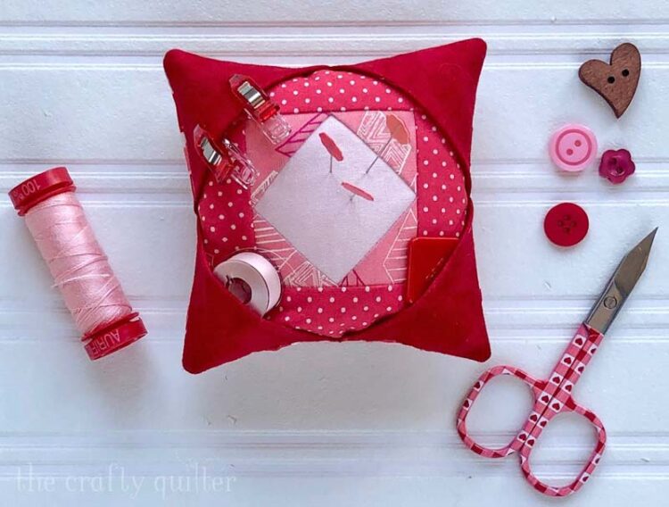 Enjoy this FREE Pincushion Pattern from Julie @ The Crafty Quilter.  It's super easy to make and has corner pockets to store little notions!