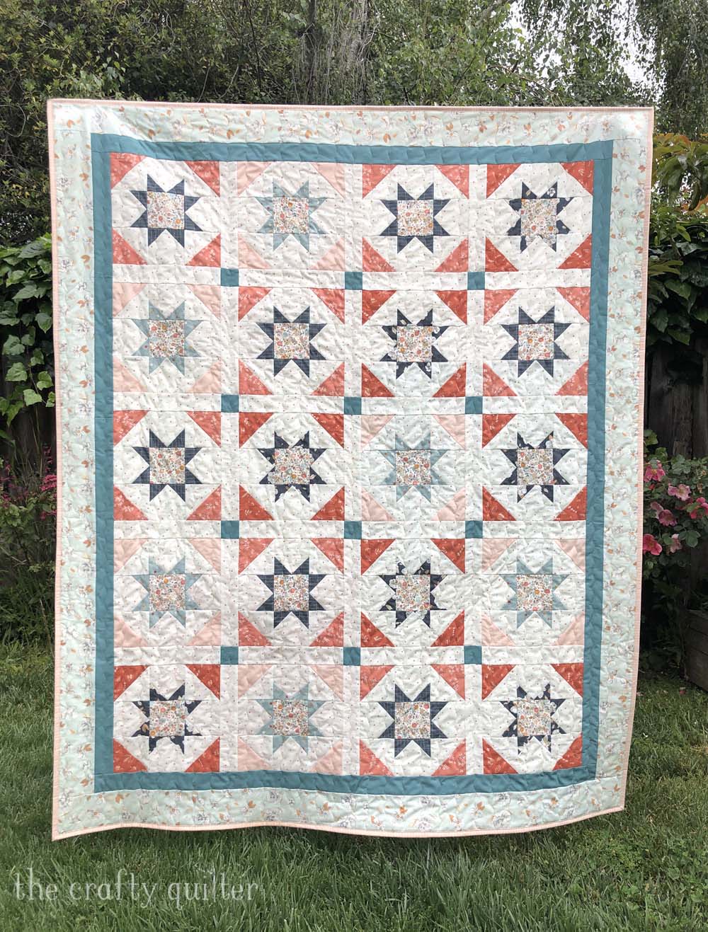 Sterling Quilt made and designed by Julie Cefalu @ The Crafty Quilter.  Fabric is from the Gayle Loraine collection from Art Gallery Fabrics.