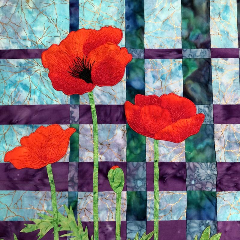 Poppy Convergence made by Julie Cefalu @ The Crafty Quilter.  Background based on the Convergence Quilts by Ricky Tims.