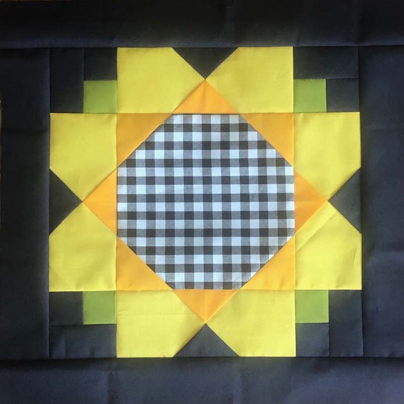 Modern version of the FREE Garden Sunflower Quilt Block @ The Crafty Quilter.