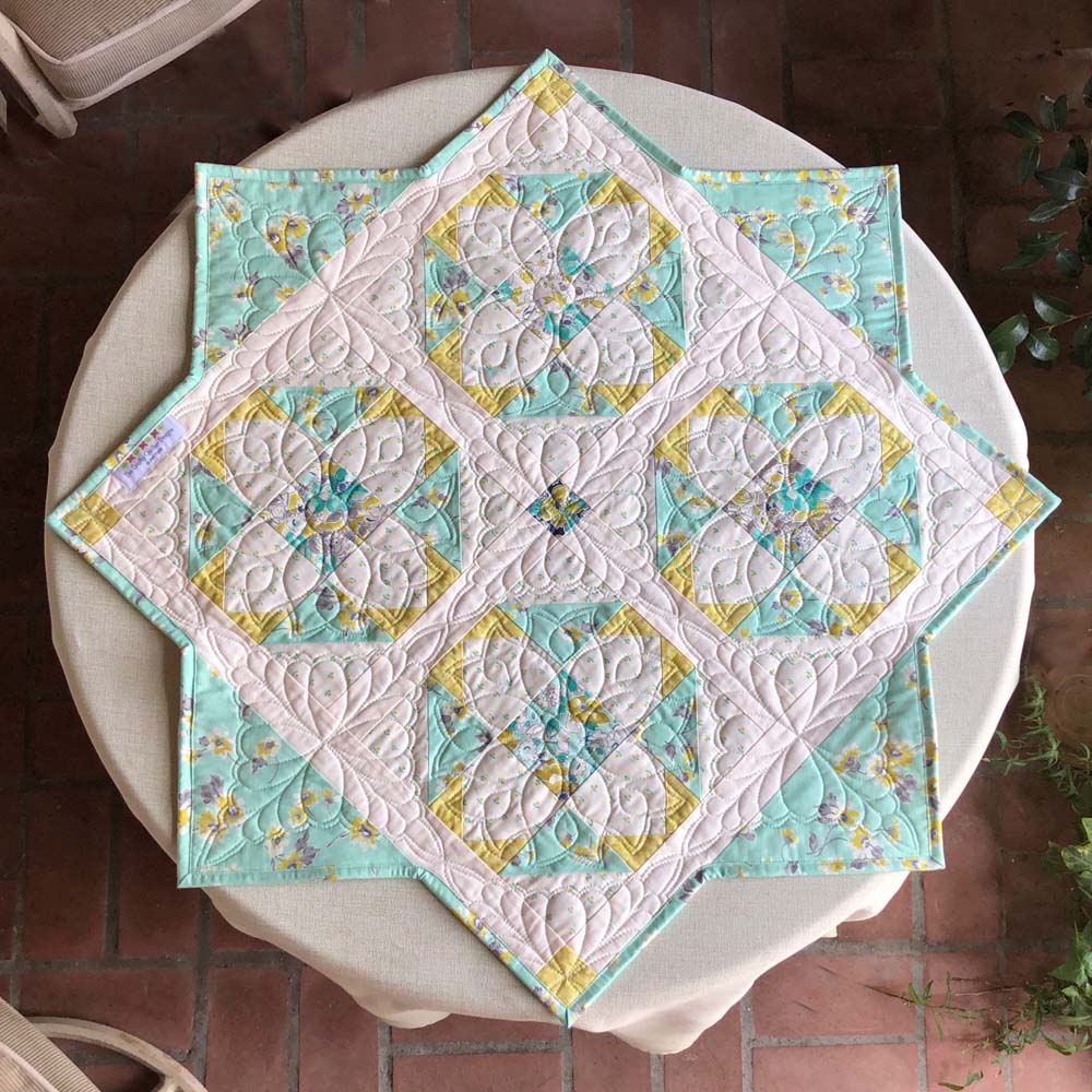All of the details on how I made this Sterling Table Topper using my Sterling Quilt Pattern @ The Crafty Quilter.