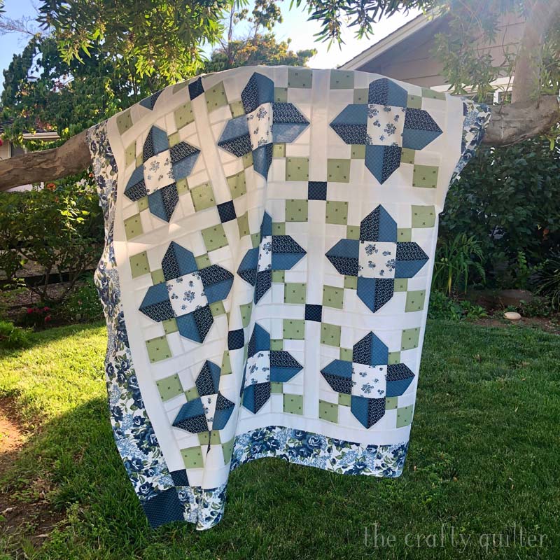 Vinca Blossom Quilt designed and made by Julie Cefalu @ the Crafty Quilter. 