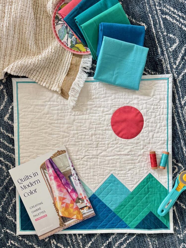 Teton Wall Hanging made by Julie Cefalu - showcasing the book Quilts In Modern Color by Amber Elliot.