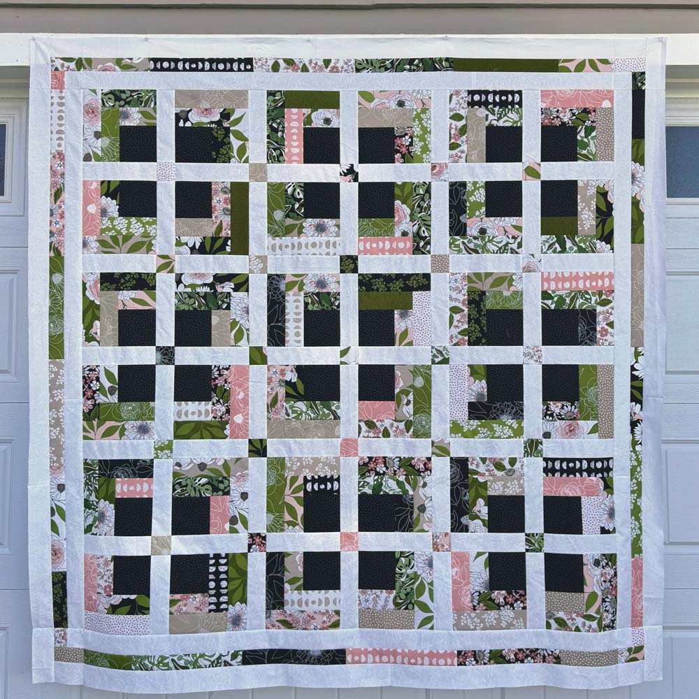 Full quilt photo hanging straight.