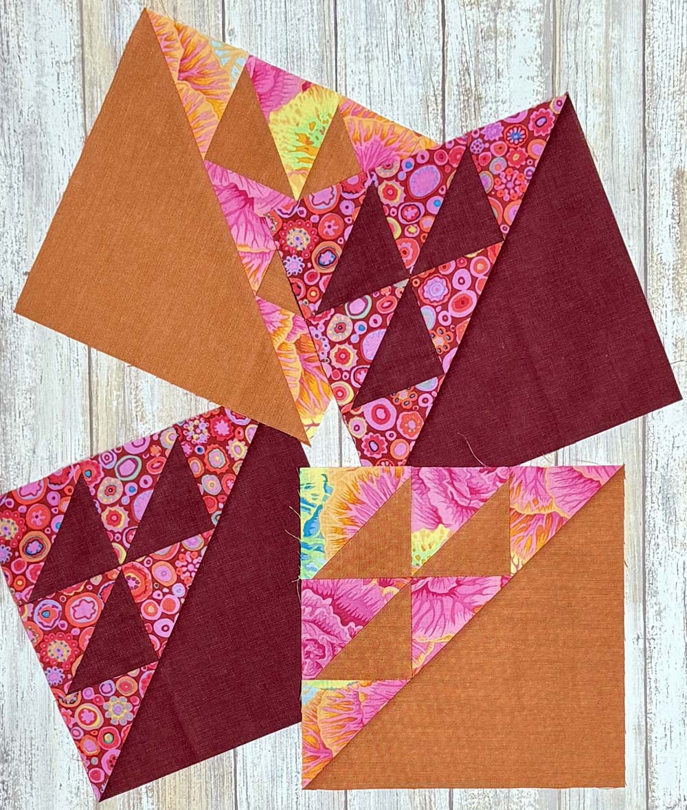 Four Birds In the Air quilt blocks finished.
