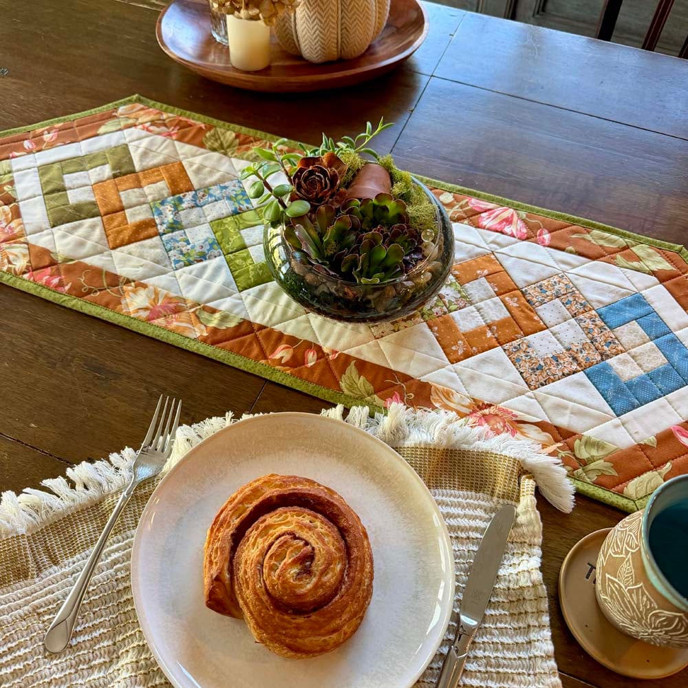 Strips & Salsa Table runner made by Julie Cefalu using a charm pack and Stripology Mini Ruler. Pattern from Stripology Strip Quilts book.